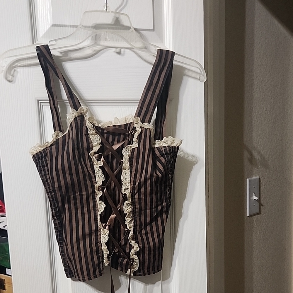 Brown sleeveless bodysuit with bustier ruffled tie front